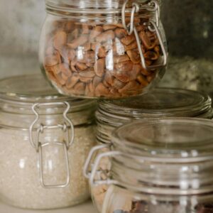 Clear Glass Jars With Brown and White Stones